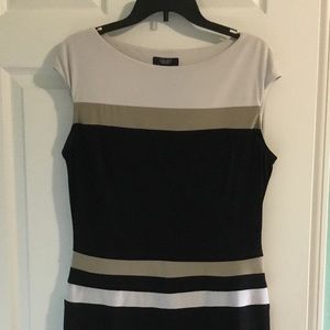 Champs stretchy Dress with accentuated waist line.